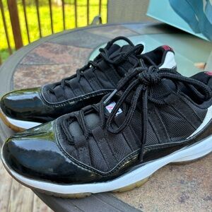Air Jordan 11 low black size 7 men 9 women’s